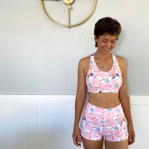 Australian ethical and sustainable activewear matching set made from recycled plastic materials. Pink floral print lycra sports bra.