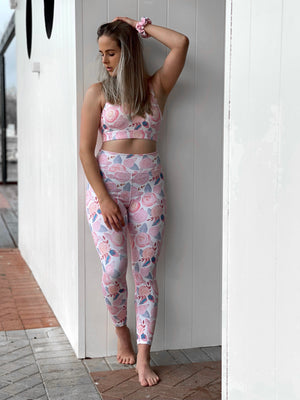 Australian ethical and sustainable activewear matching set made from recycled plastic materials. Pink floral print lycra sports bra.